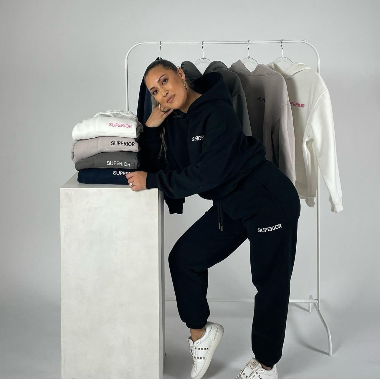 Jessie taking a photo with her products